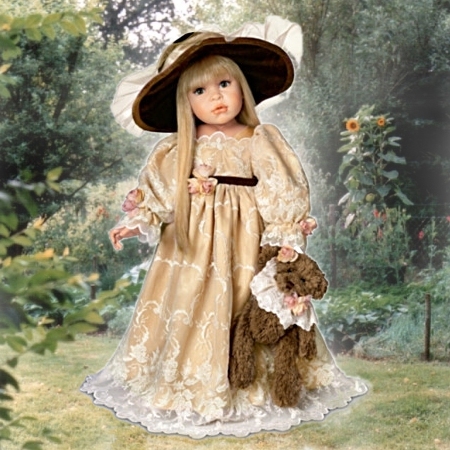 Girl doll with dressed bear